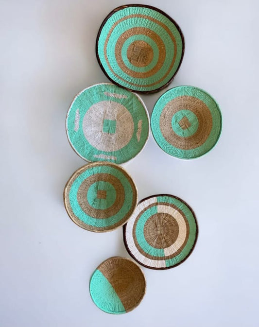 turquoise woven baskets with patterns
