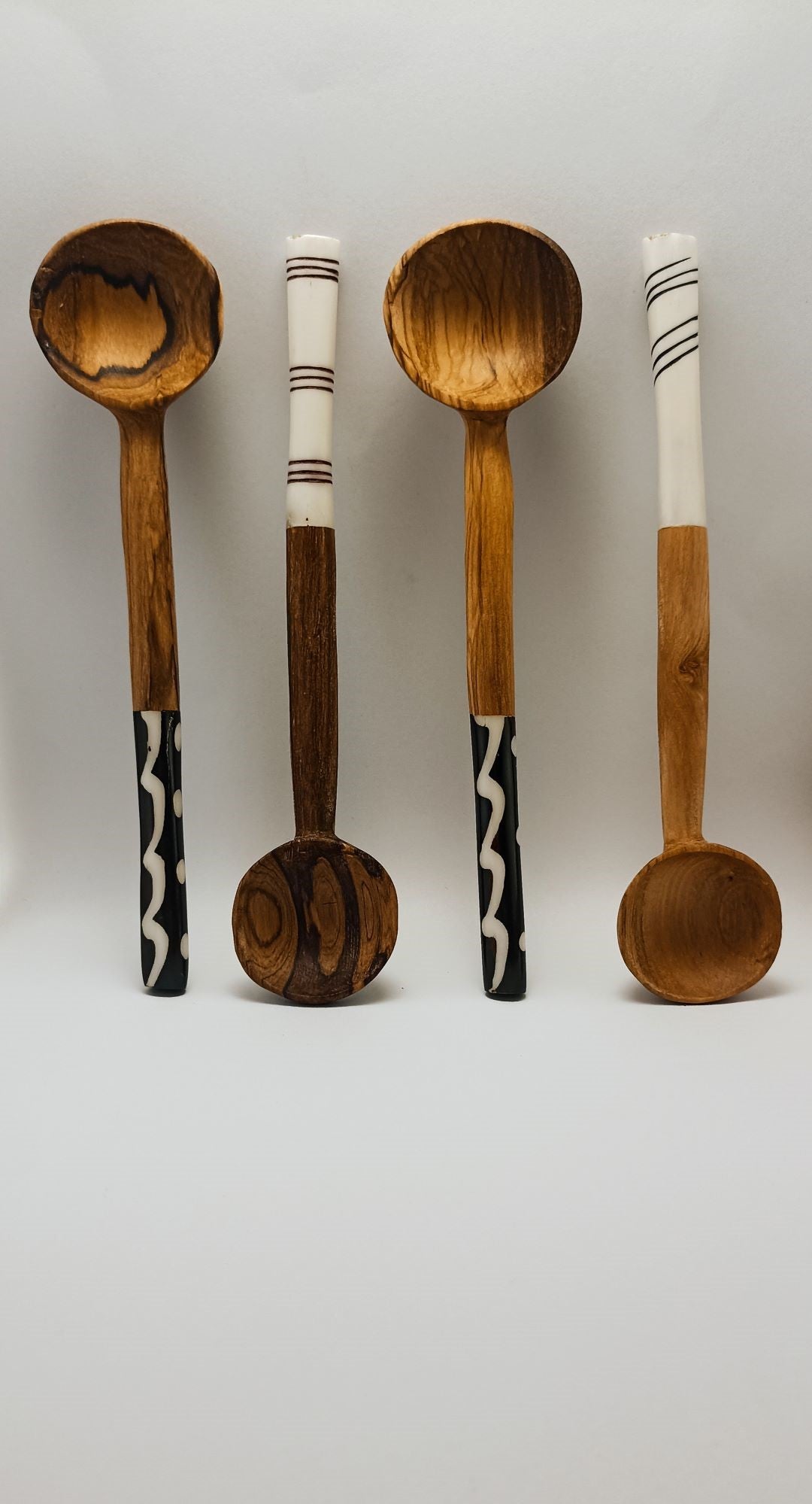 Wooden spoon set with bone insert.